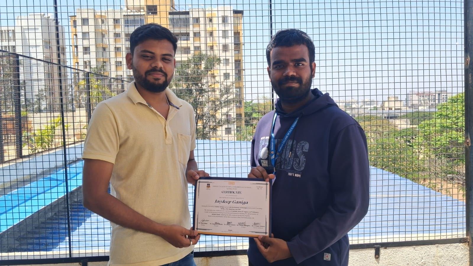 A TheOFCO intern receiving their certificate of completion